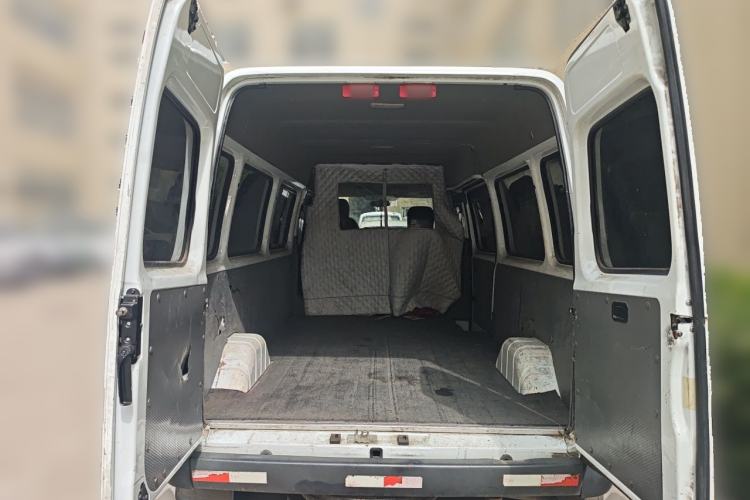 Used JMC Transit 2019 2.8T Commercial Version Long Wheelbase Mid-Roof 6-Seater Rear Single Tire China VI Emission Standard – JX493 Trunk