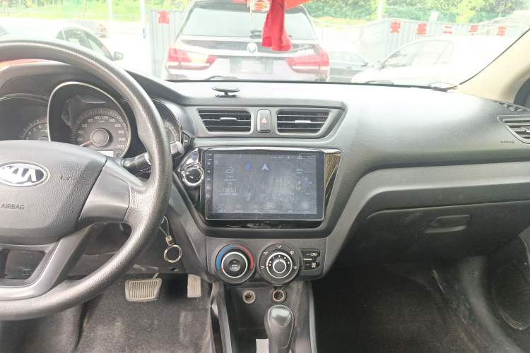 Used Kia K2 2012 Sedan 1.4L Automatic GLS Commemorative Edition Audio And AC Panel
