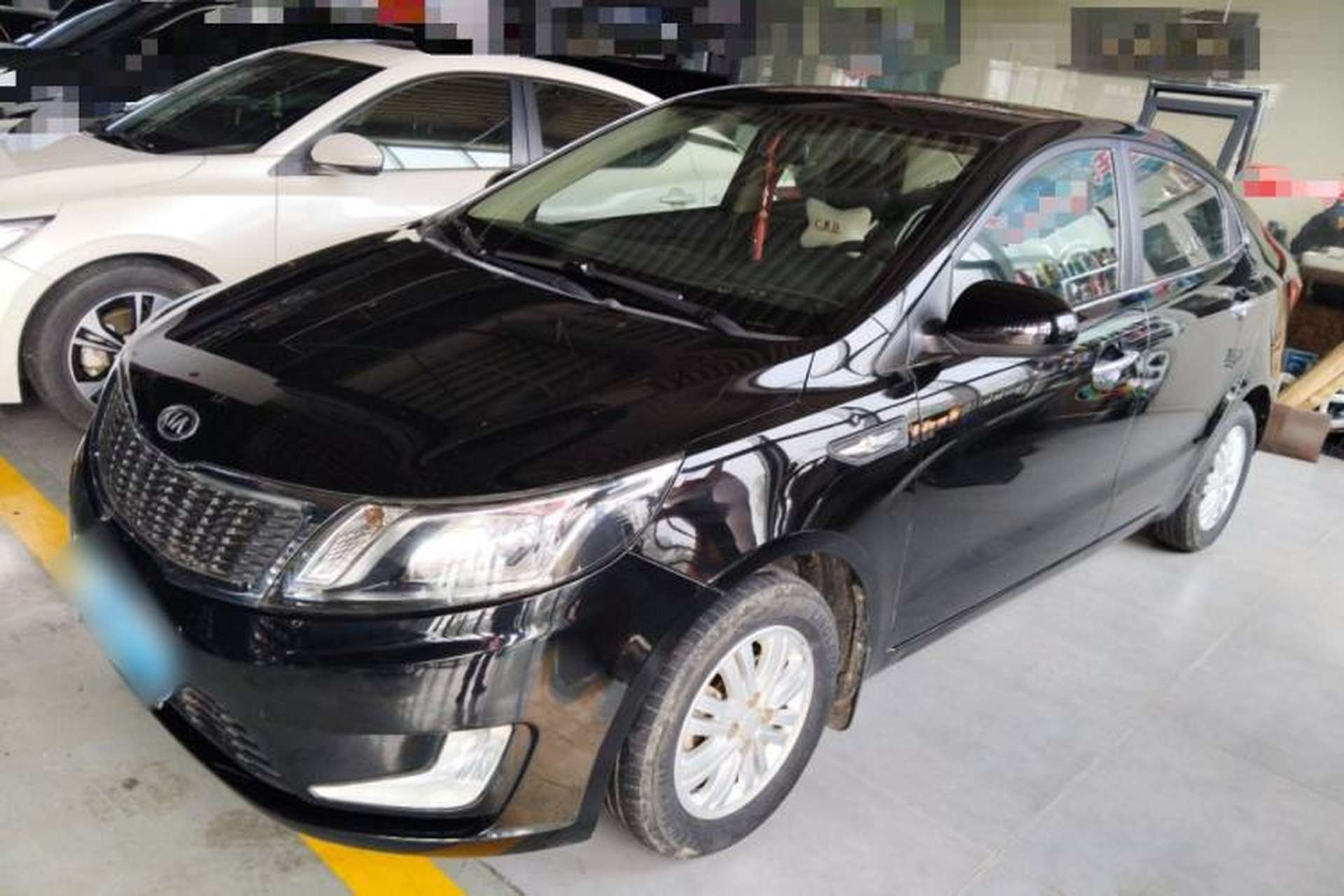 Used Kia K2 2012 Sedan 1.4L MT GLS Commemorative Edition Front Left 45 Deg