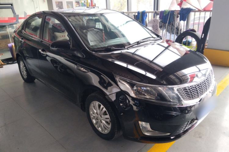 Used Kia K2 2012 Sedan 1.4L MT GLS Commemorative Edition Front Right 45 Deg