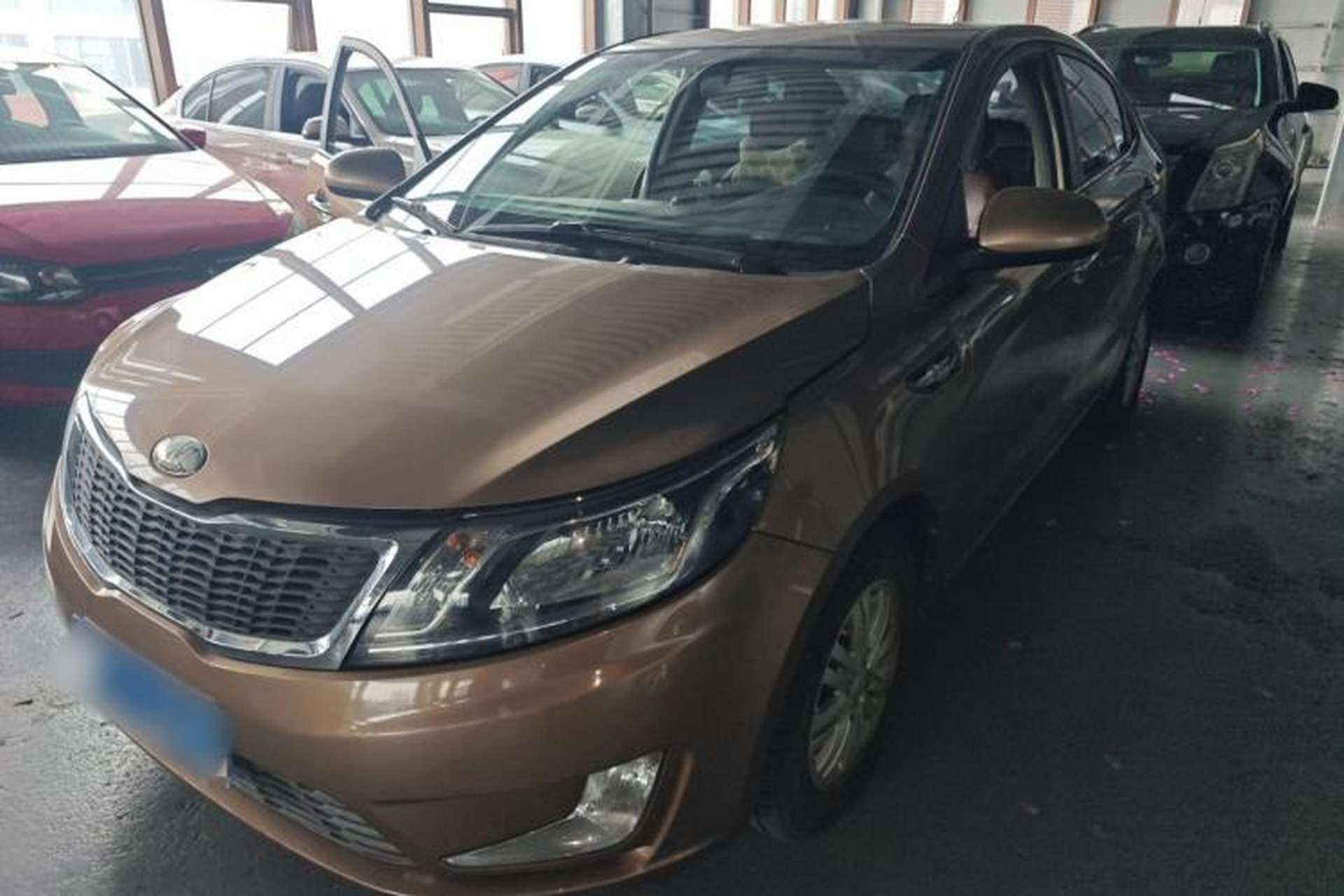 Used Kia K2 2012 Sedan 1.4L MT GLS Commemorative Edition Front Left 45 Deg