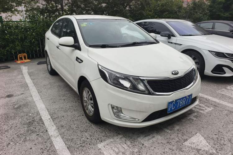 Used Kia K2 2012 Sedan 1.4L MT GLS Commemorative Edition Front Right 45 Deg