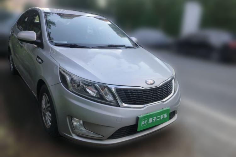 Used Kia K2 2012 Sedan 1.4L MT GLS Commemorative Edition Front Right 45 Deg