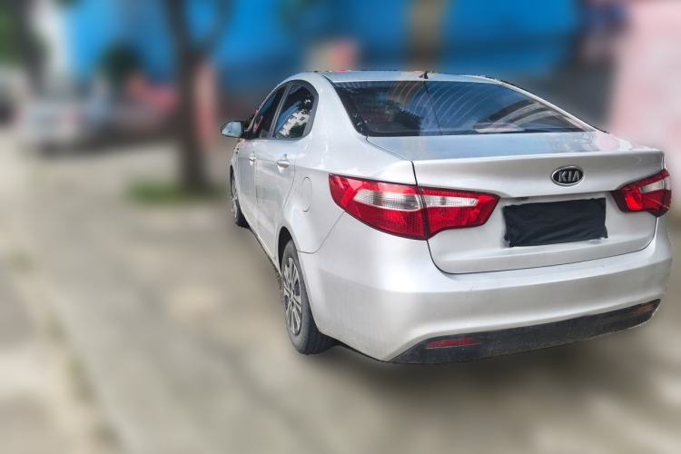 Used Kia K2 2012 Sedan 1.4L Automatic GLS Commemorative Edition Rear Left 45 Deg