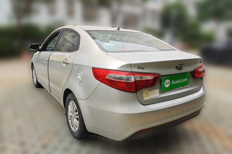 Used Kia K2 2012 Sedan 1.4L Automatic GLS Commemorative Edition Rear Left 45 Deg