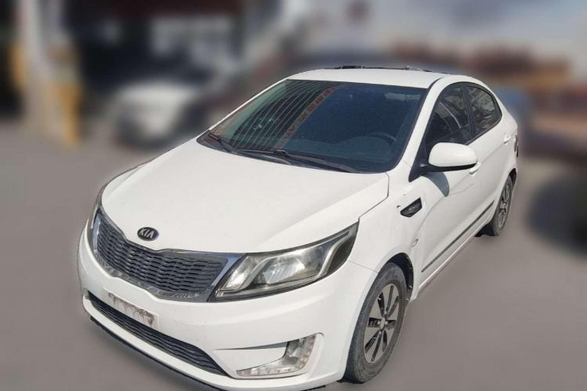Used Kia K2 2012 Sedan 1.4L Automatic GLS Commemorative Edition Front Left 45 Deg