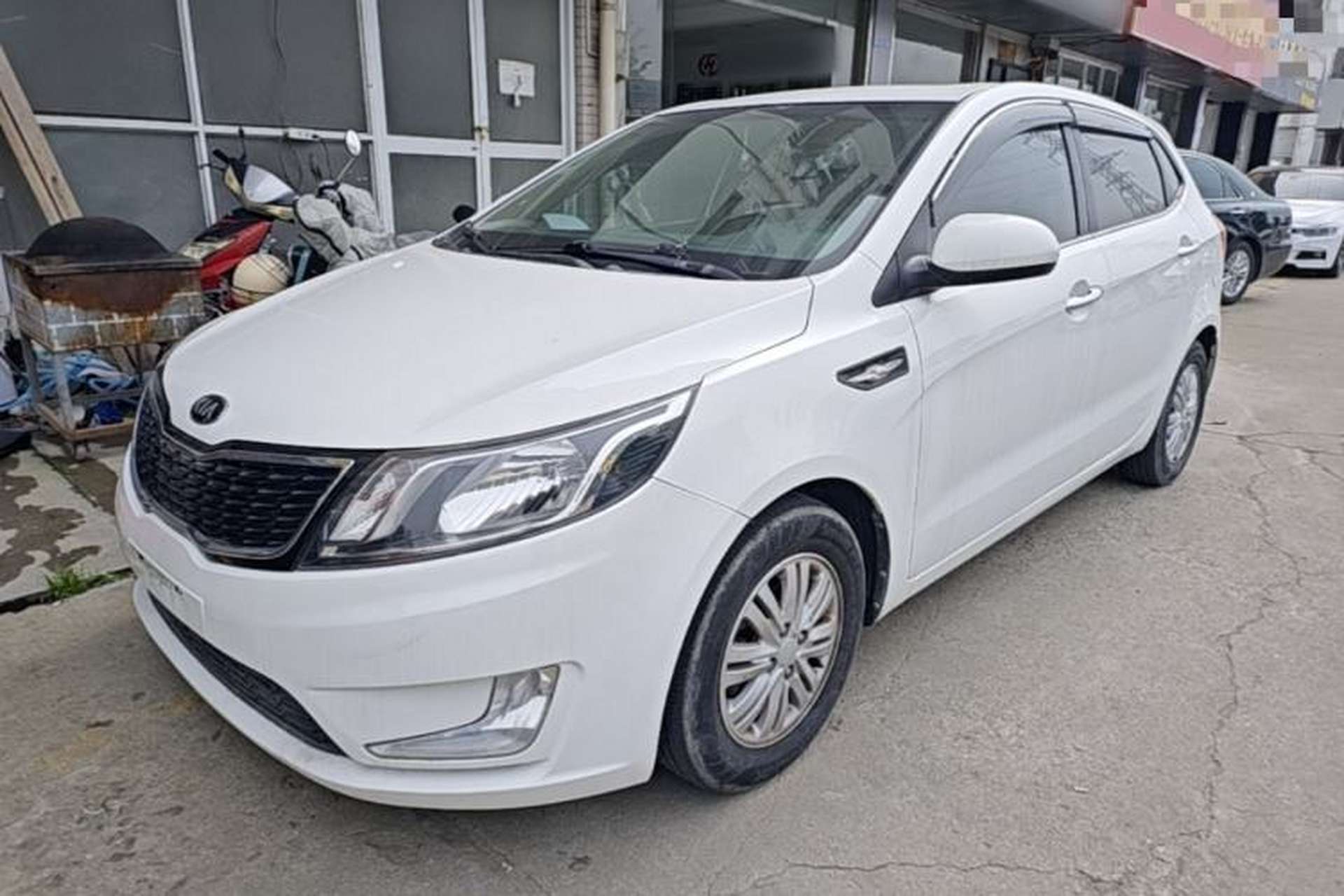 Used Kia K2 2012 Hatchback 1.4L Automatic Cool Edition Front Left 45 Deg