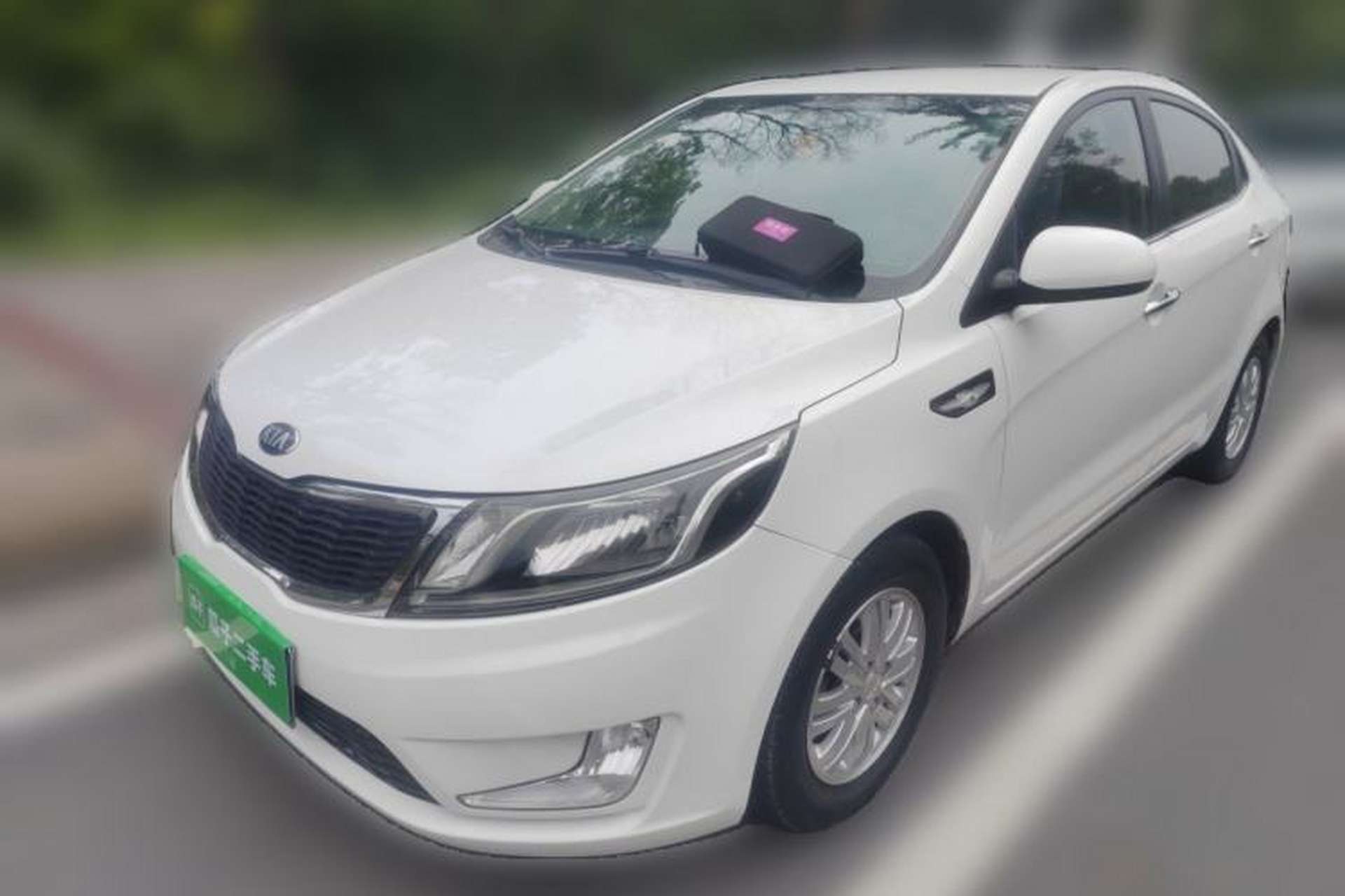 Used Kia K2 2012 Sedan 1.4L Automatic GLS Commemorative Edition Front Left 45 Deg