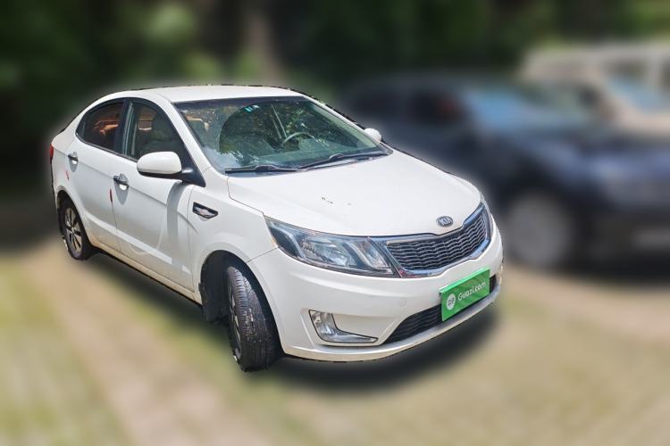 Used Kia K2 2012 Sedan 1.4L MT GL Commemorative Edition Front Right 45 Deg