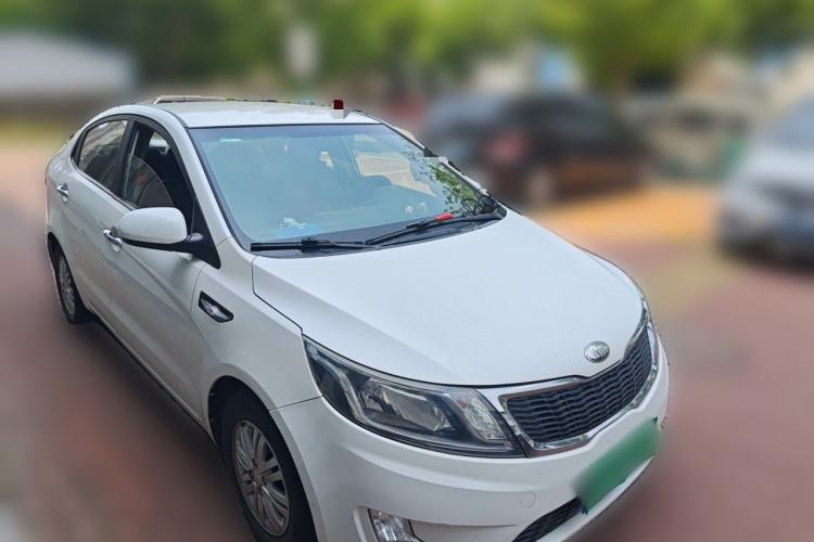 Used Kia K2 2012 Sedan 1.4L MT GLS Commemorative Edition Front Right 45 Deg