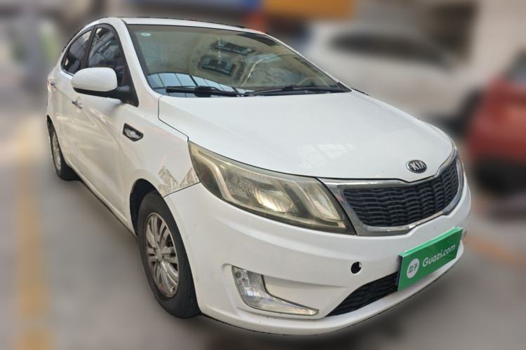 Used Kia K2 2012 Sedan 1.4L MT GLS Commemorative Edition Front Right 45 Deg