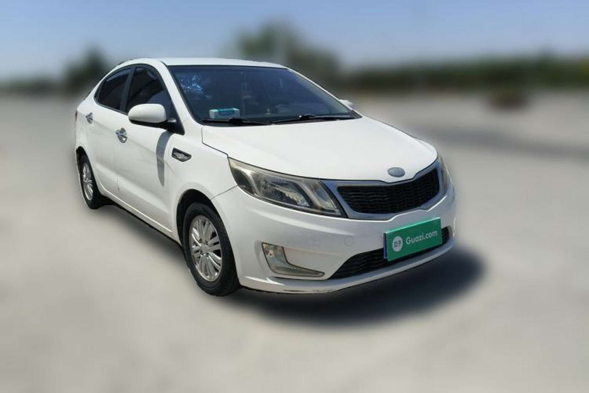 Used Kia K2 2012 Sedan 1.4L MT GLS Commemorative Edition Front Right 45 Deg