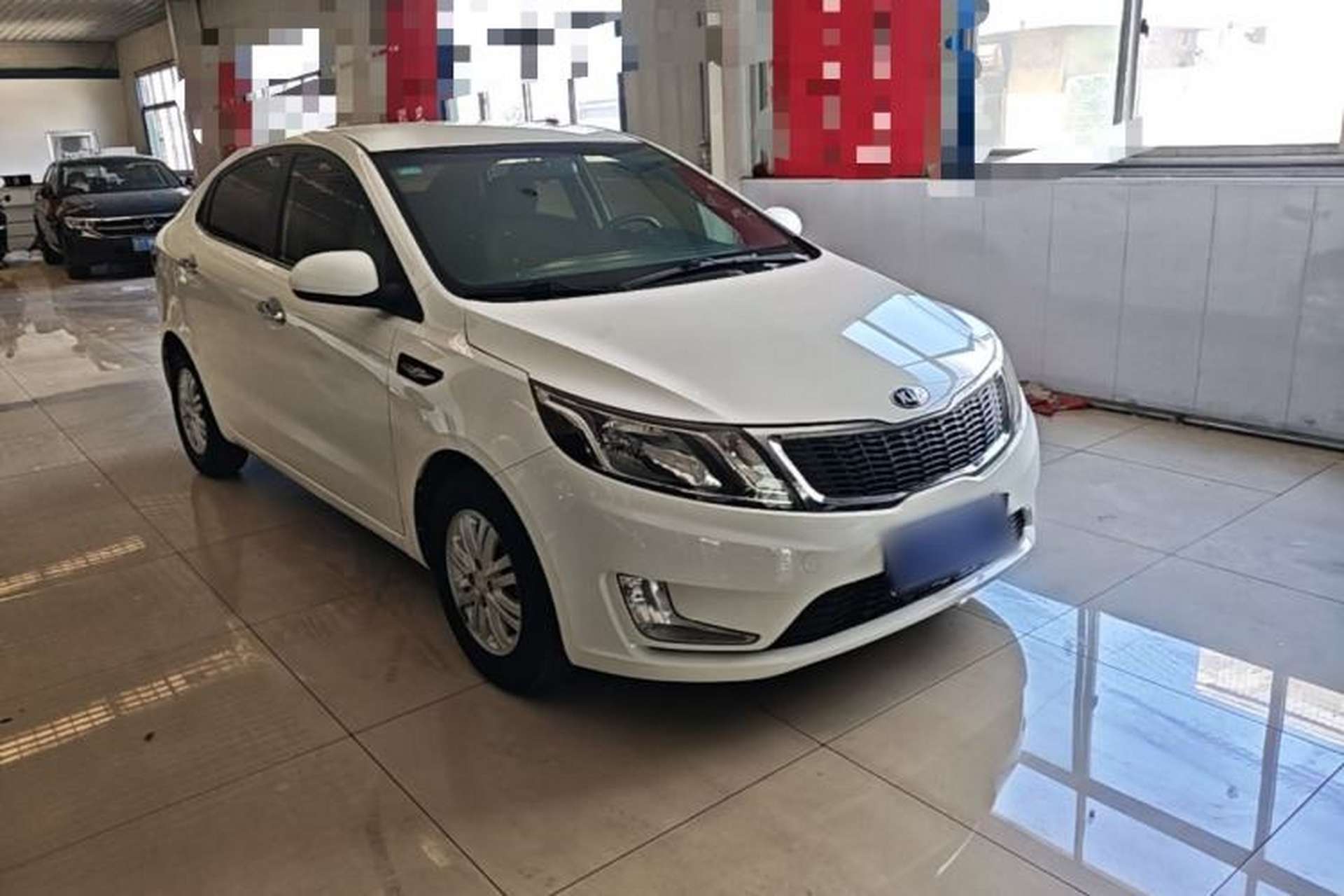Used Kia K2 2012 Sedan 1.4L MT GLS Commemorative Edition Front Right 45 Deg
