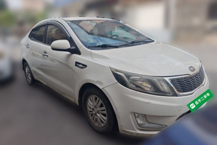 Used Kia K2 2012 Sedan 1.4L MT GLS Commemorative Edition Front Right 45 Deg