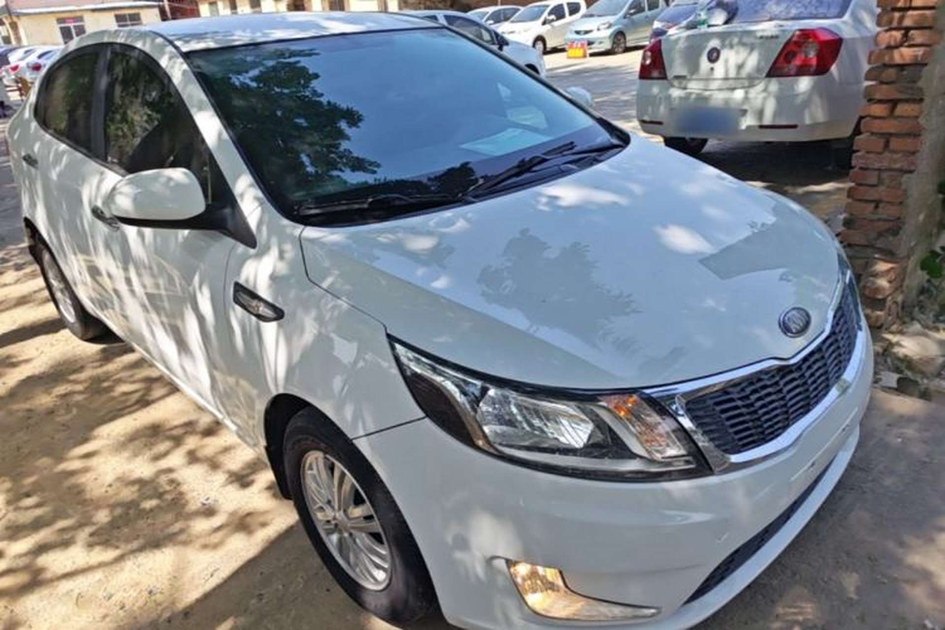 Used Kia K2 2012 Sedan 1.4L MT GLS Commemorative Edition Front Right 45 Deg