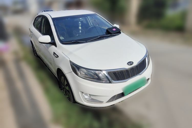 Used Kia K2 2012 Sedan 1.4L MT GLS Commemorative Edition Front Right 45 Deg