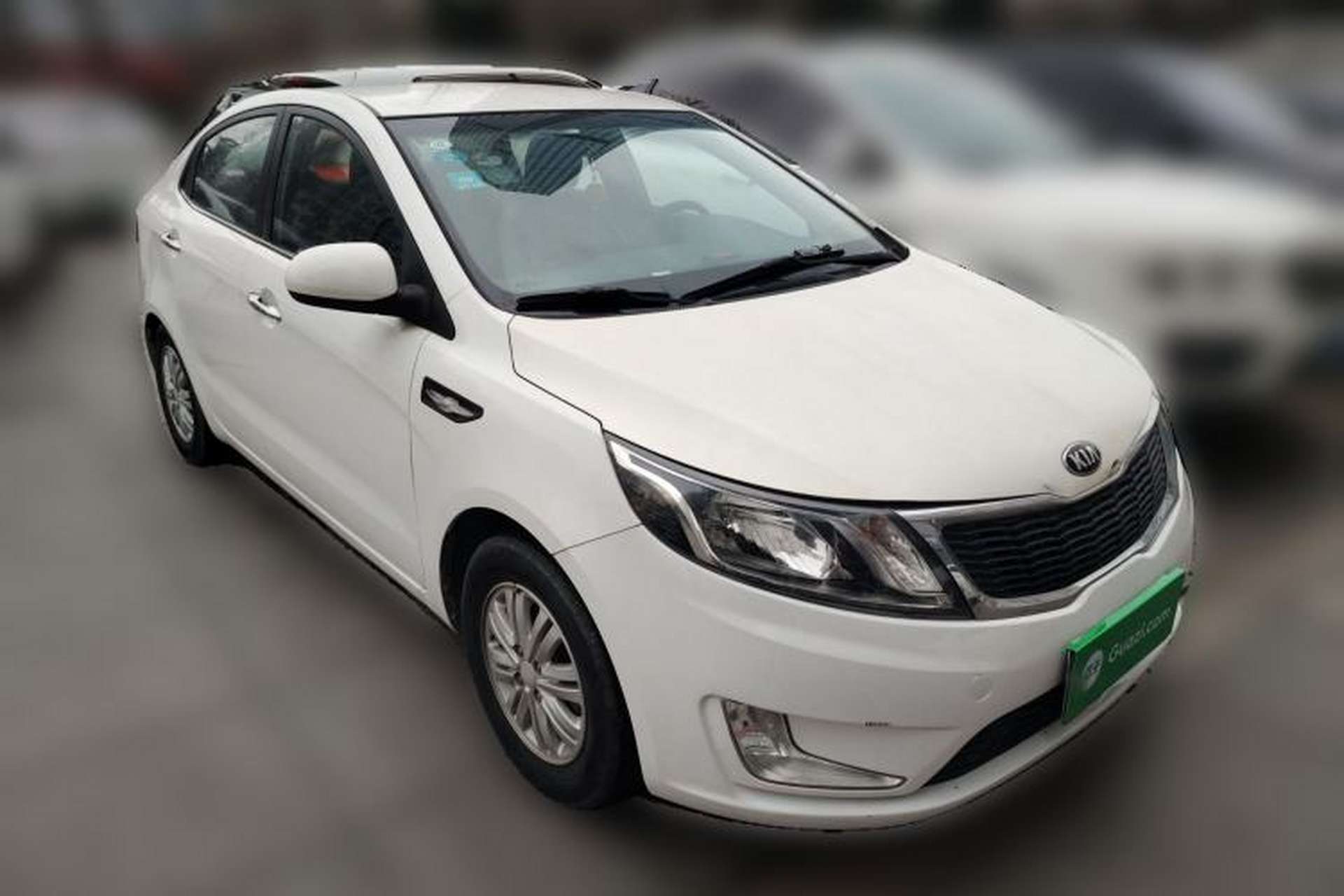 Used Kia K2 2012 Sedan 1.4L MT GLS Commemorative Edition Front Right 45 Deg