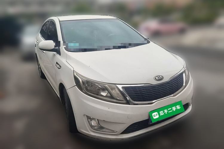 Used Kia K2 2012 Sedan 1.4L MT GLS Commemorative Edition Front Right 45 Deg
