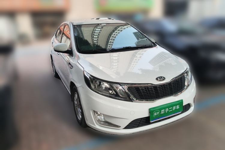 Used Kia K2 2012 Sedan 1.4L MT GLS Commemorative Edition Front Right 45 Deg