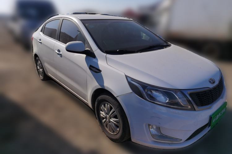 Used Kia K2 2012 Sedan 1.4L MT GLS Commemorative Edition Front Right 45 Deg