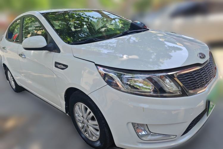 Used Kia K2 2012 Sedan 1.4L MT GLS Commemorative Edition Front Right 45 Deg