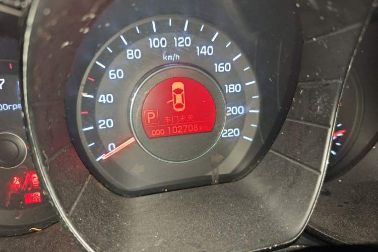 Used Kia K2 2012 Sedan 1.6L Automatic Transmission Premium Commemorative Edition Odometer Close Up