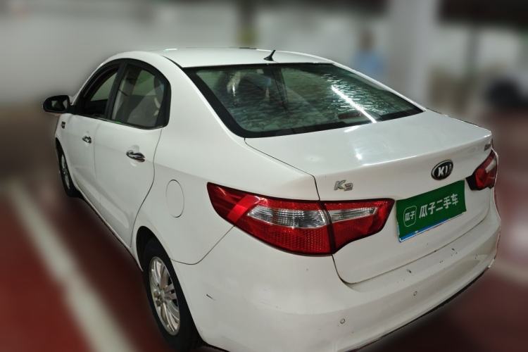 Used Kia K2 2012 Sedan 1.4L Automatic GLS Commemorative Edition Rear Left 45 Deg