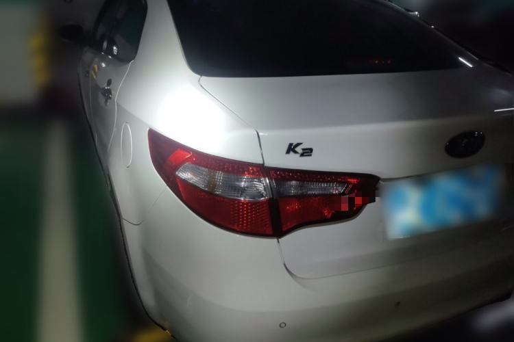 Used Kia K2 2012 Sedan 1.6L Automatic Transmission Premium Commemorative Edition Rear Left 45 Deg