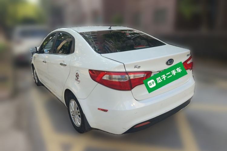 Used Kia K2 2012 Sedan 1.4L Automatic GLS Commemorative Edition Rear Left 45 Deg