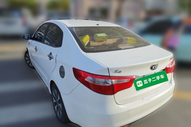 Used Kia K2 2012 Sedan 1.4L Automatic GLS Commemorative Edition Rear Left 45 Deg