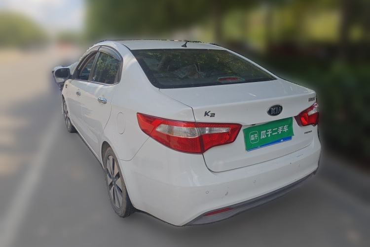 Used Kia K2 2012 Sedan 1.6L Automatic Transmission Premium Commemorative Edition Rear Left 45 Deg