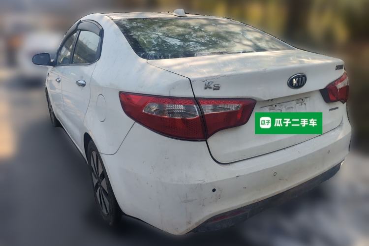 Used Kia K2 2012 Sedan 1.6L Automatic Transmission Premium Commemorative Edition Rear Left 45 Deg