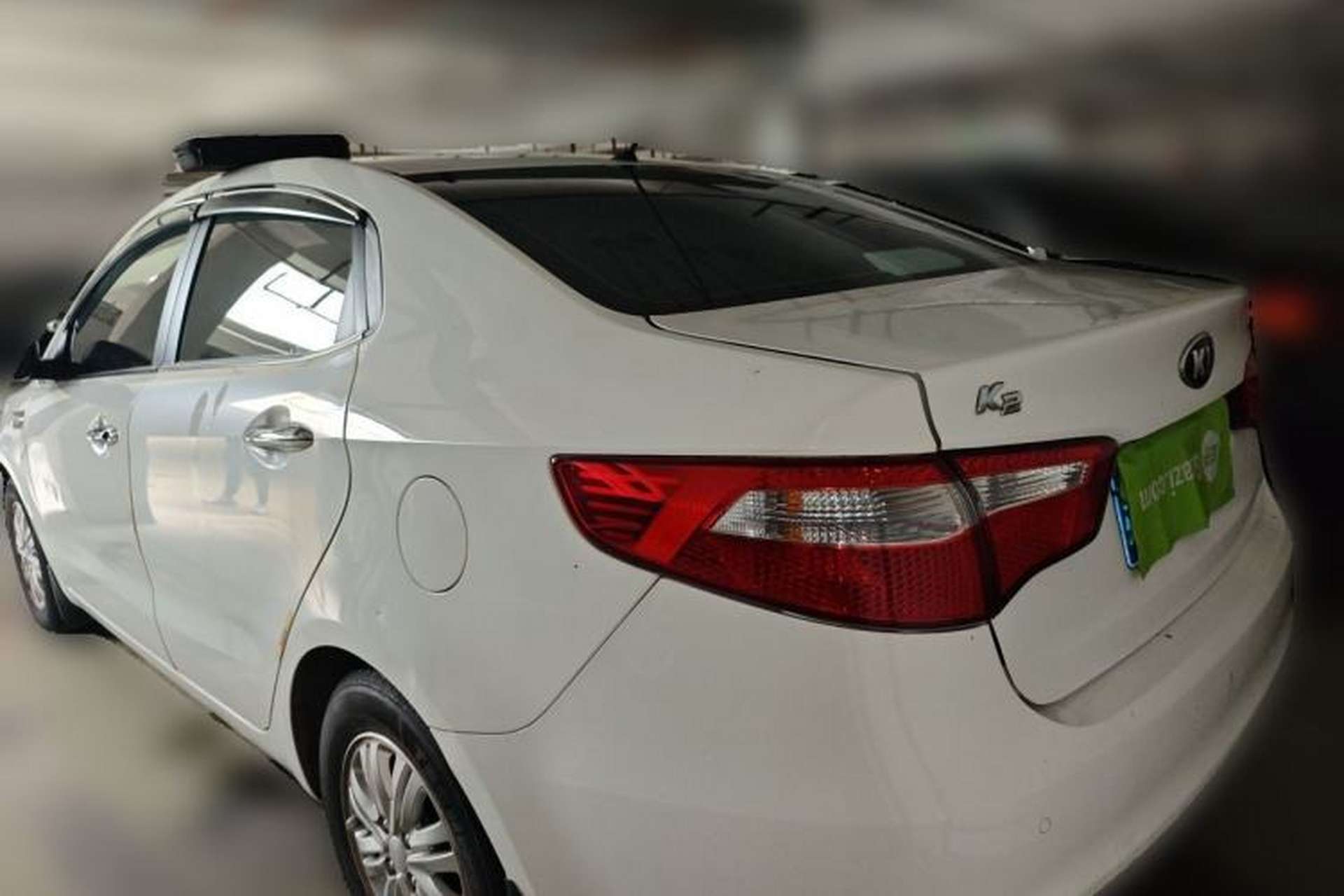 Used Kia K2 2012 Sedan 1.4L Automatic GLS Commemorative Edition Rear Left 45 Deg