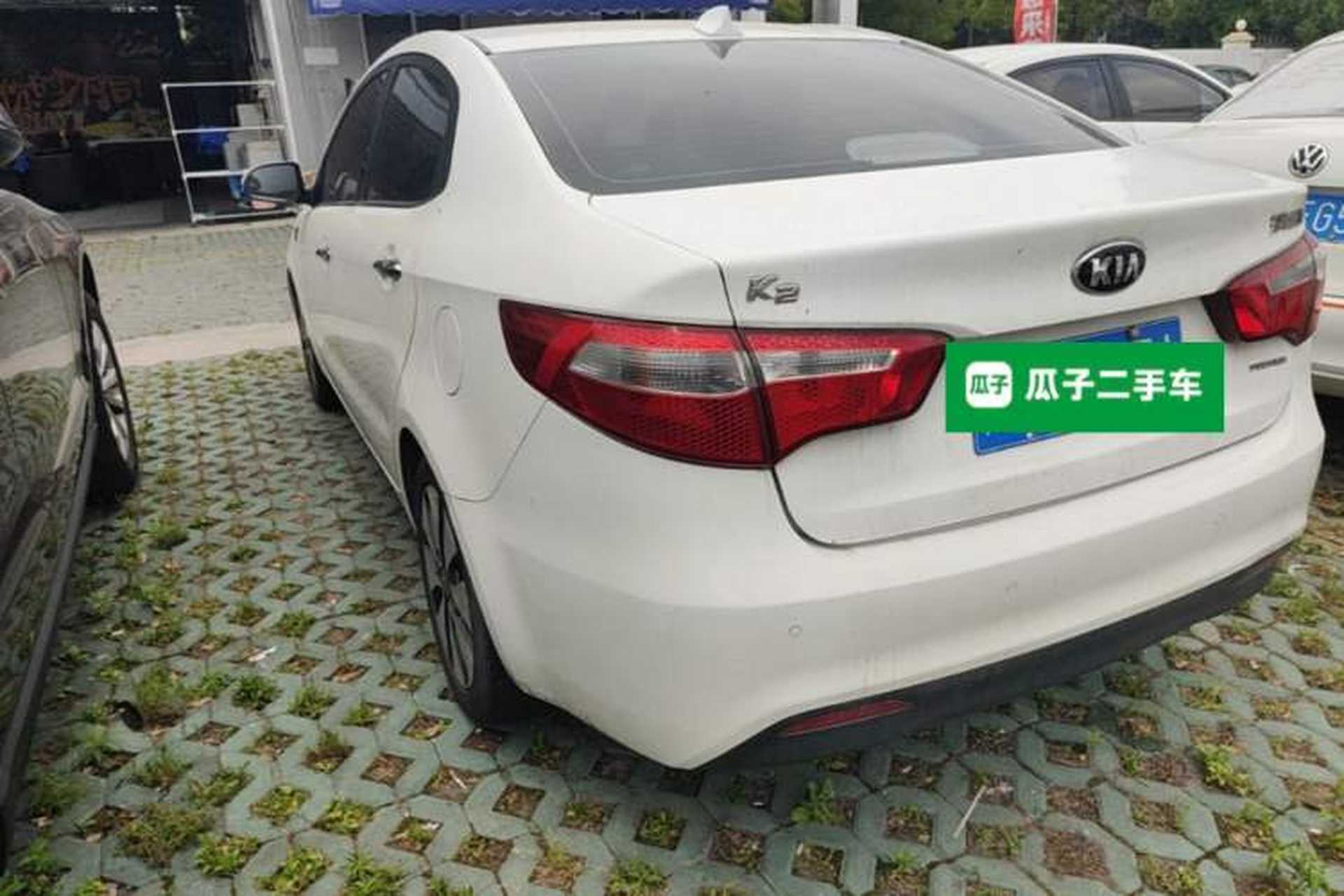 Used Kia K2 2012 Sedan 1.6L Automatic Transmission Premium Commemorative Edition Rear Left 45 Deg