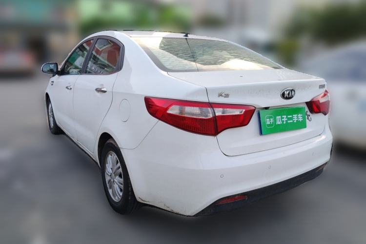 Used Kia K2 2012 Sedan 1.4L Automatic GLS Commemorative Edition Rear Left 45 Deg
