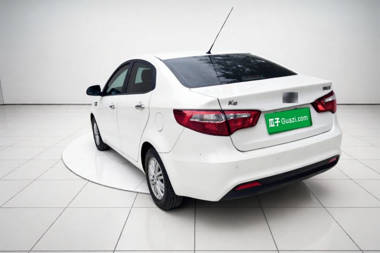 Used Kia K2 2012 Sedan 1.4L Automatic GLS Commemorative Edition Rear Left 45 Deg