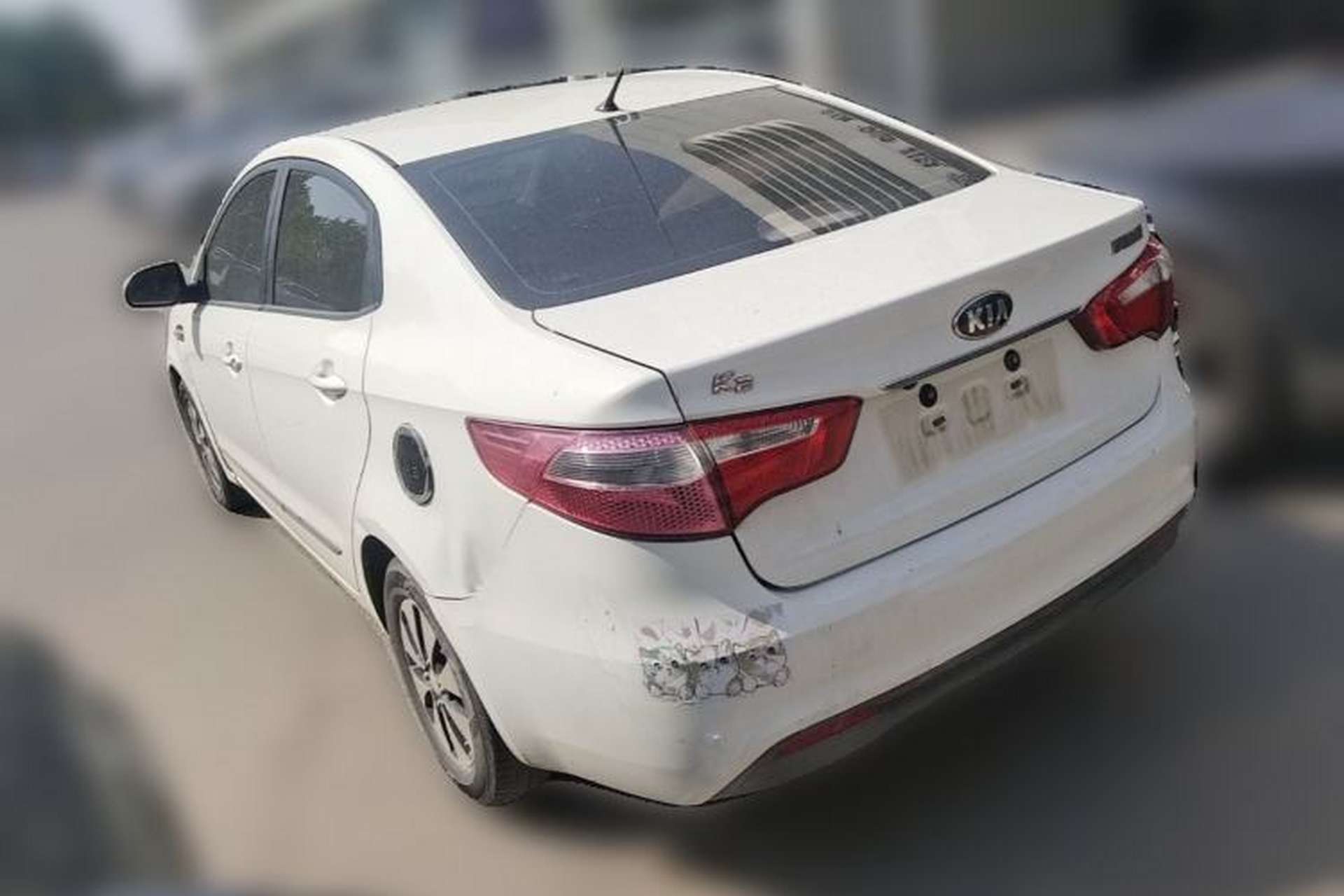 Used Kia K2 2012 Sedan 1.4L Automatic GLS Commemorative Edition Rear Left 45 Deg
