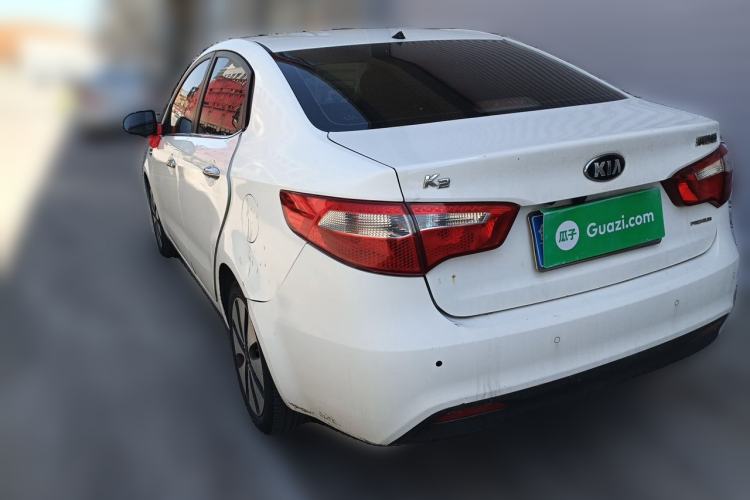 Used Kia K2 2012 Sedan 1.6L Automatic Transmission Premium Commemorative Edition Rear Left 45 Deg