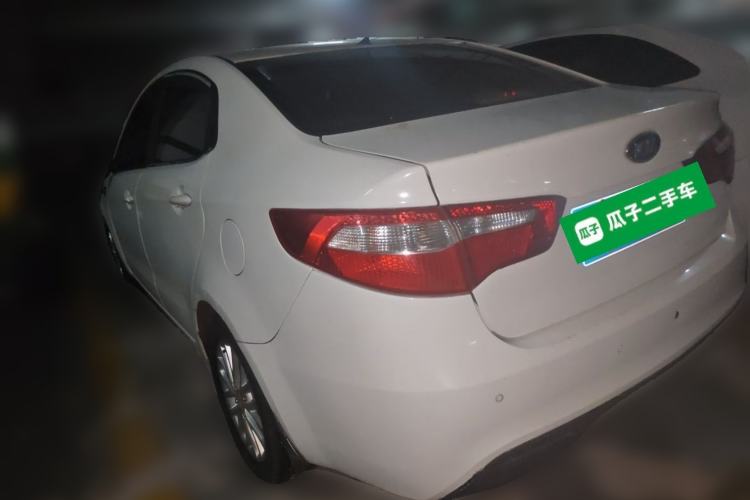 Used Kia K2 2012 Sedan 1.4L Automatic GLS Commemorative Edition Rear Left 45 Deg