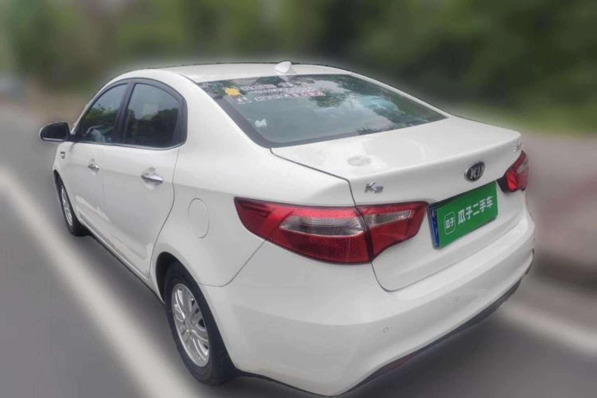 Used Kia K2 2012 Sedan 1.4L Automatic GLS Commemorative Edition Rear Left 45 Deg