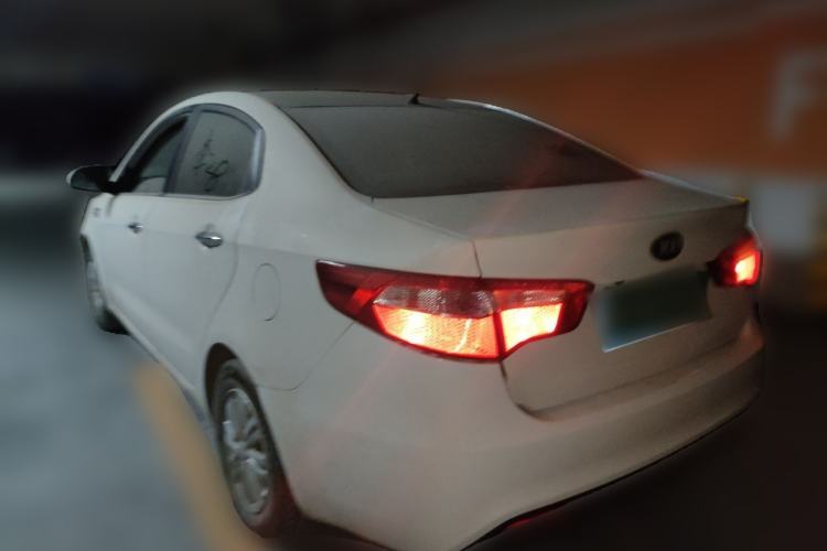 Used Kia K2 2012 Sedan 1.4L Automatic GLS Commemorative Edition Rear Left 45 Deg