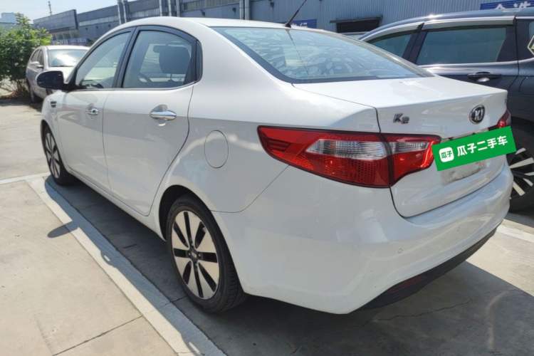 Used Kia K2 2012 Sedan 1.6L Automatic Transmission Premium Commemorative Edition Rear Left 45 Deg