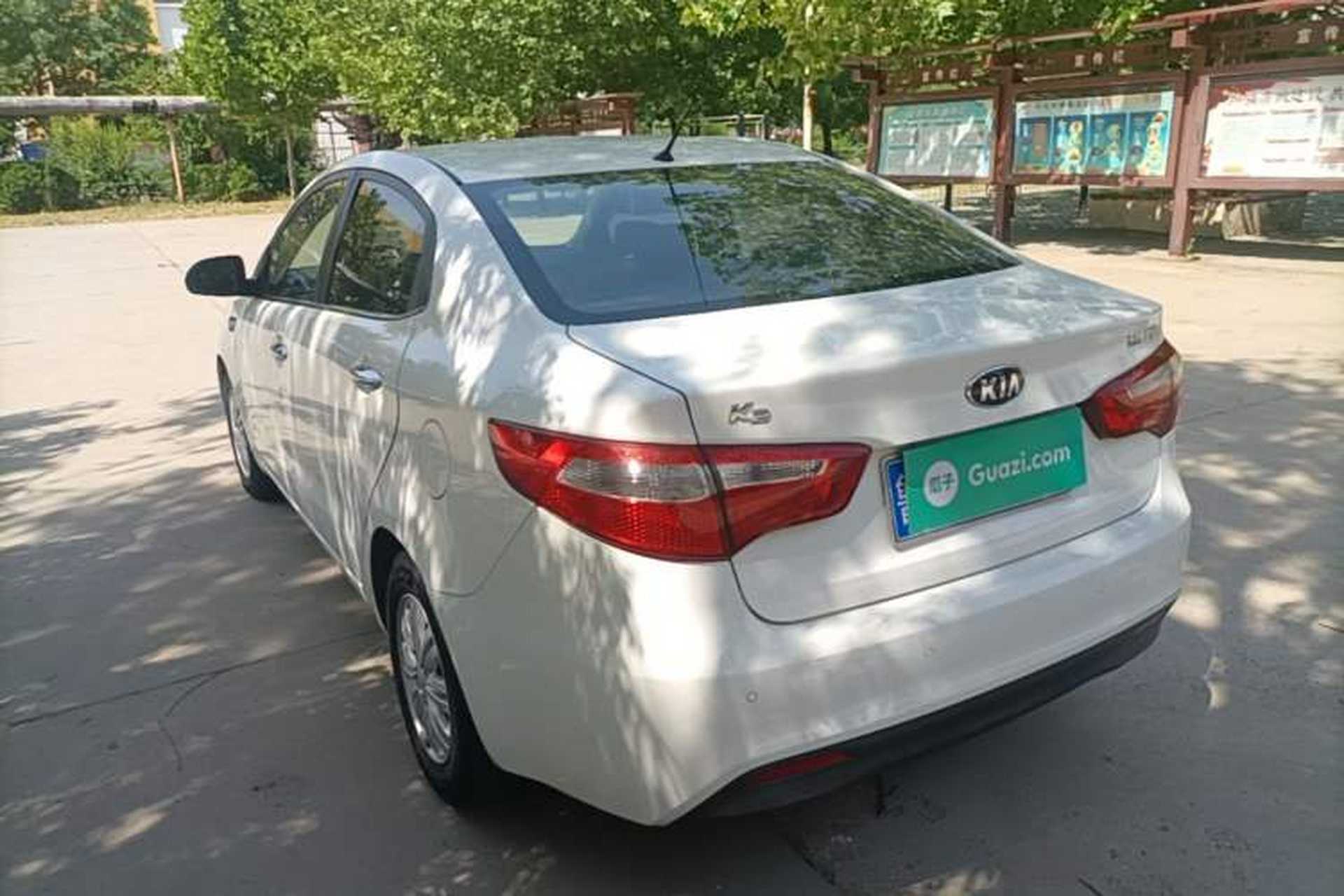 Used Kia K2 2012 Sedan 1.4L Automatic GLS Commemorative Edition Rear Left 45 Deg