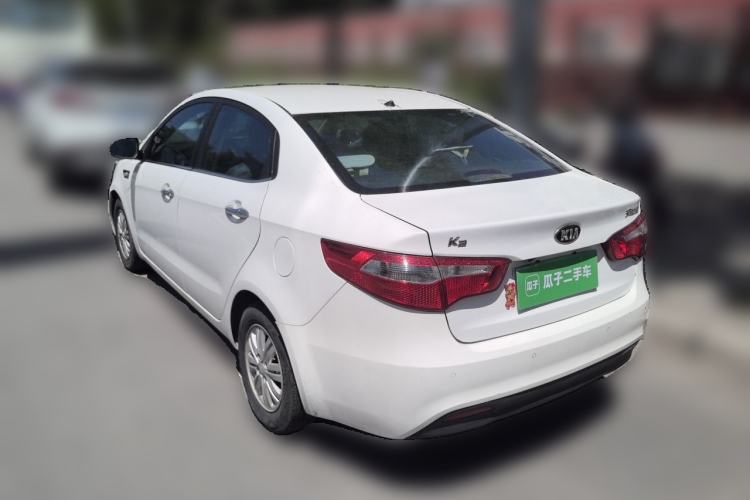 Used Kia K2 2012 Sedan 1.4L Automatic GLS Commemorative Edition Rear Left 45 Deg