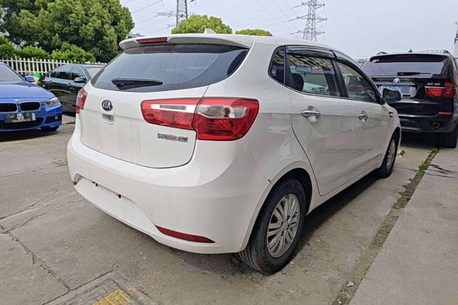 Used Kia K2 2012 Hatchback 1.4L Automatic Cool Edition Rear Right 45 Deg