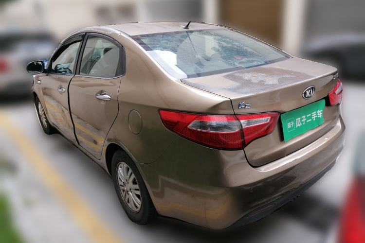 Used Kia K2 2012 Sedan 1.4L Automatic GLS Commemorative Edition Rear Left 45 Deg