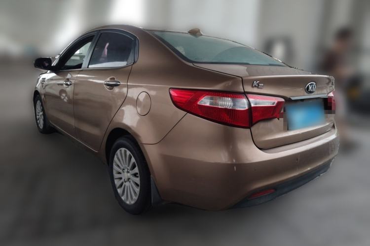 Used Kia K2 2012 Sedan 1.4L Automatic GLS Commemorative Edition Rear Left 45 Deg