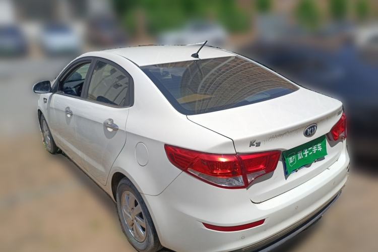 Used Kia K2 2015 Sedan 1.4L Manual Transmission GL Rear Left 45 Deg