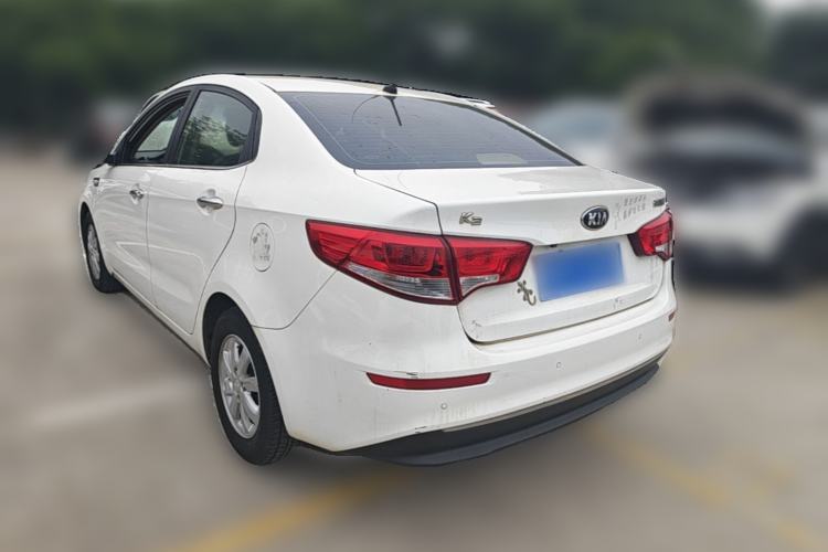 Used Kia K2 2015 Sedan 1.4L Manual Transmission GL Rear Left 45 Deg