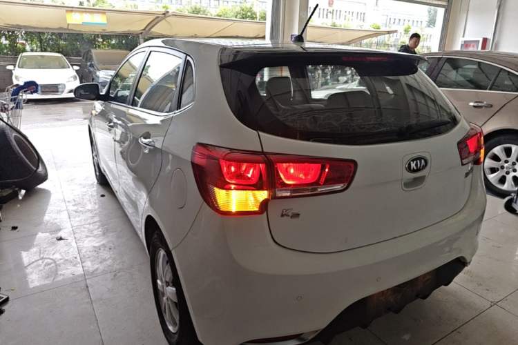 Used Kia K2 2015 Hatchback 1.4L AT GLS Cool Edition Rear Left 45 Deg